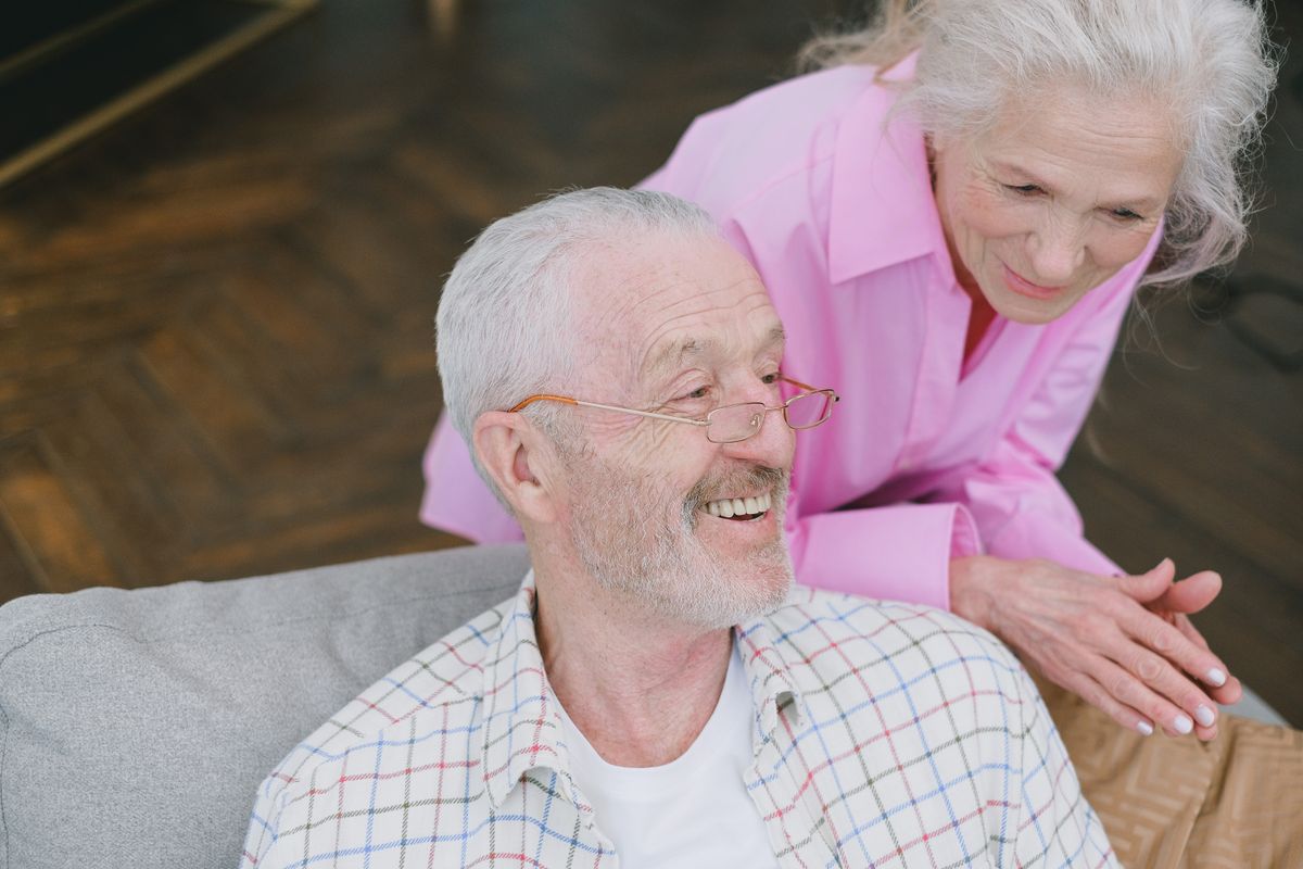 A happy senior couple enjoying peace of mind at home
